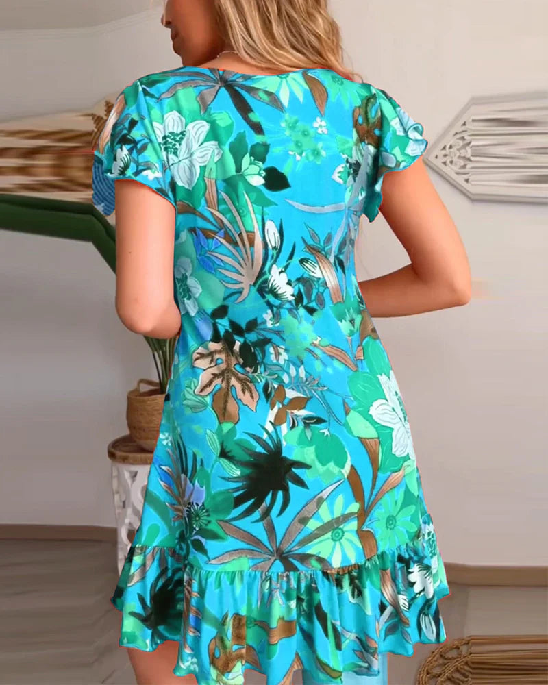 Elara | Abito a fiori con scollo a V e volant