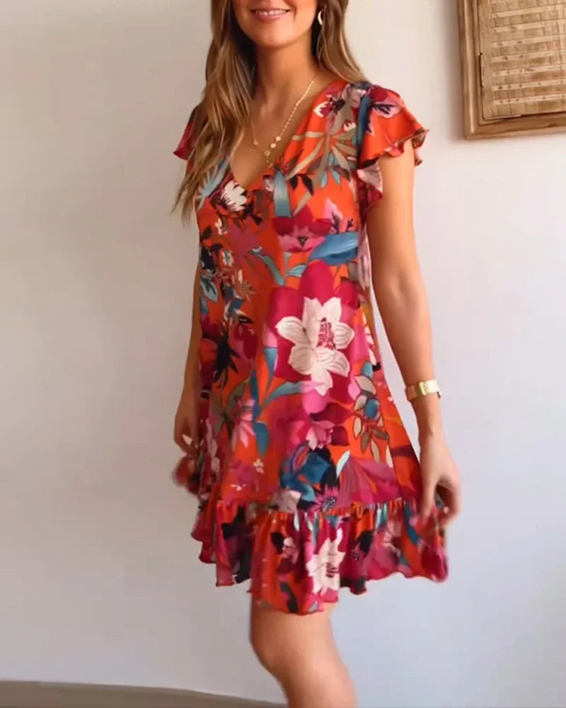 Elara | Abito a fiori con scollo a V e volant