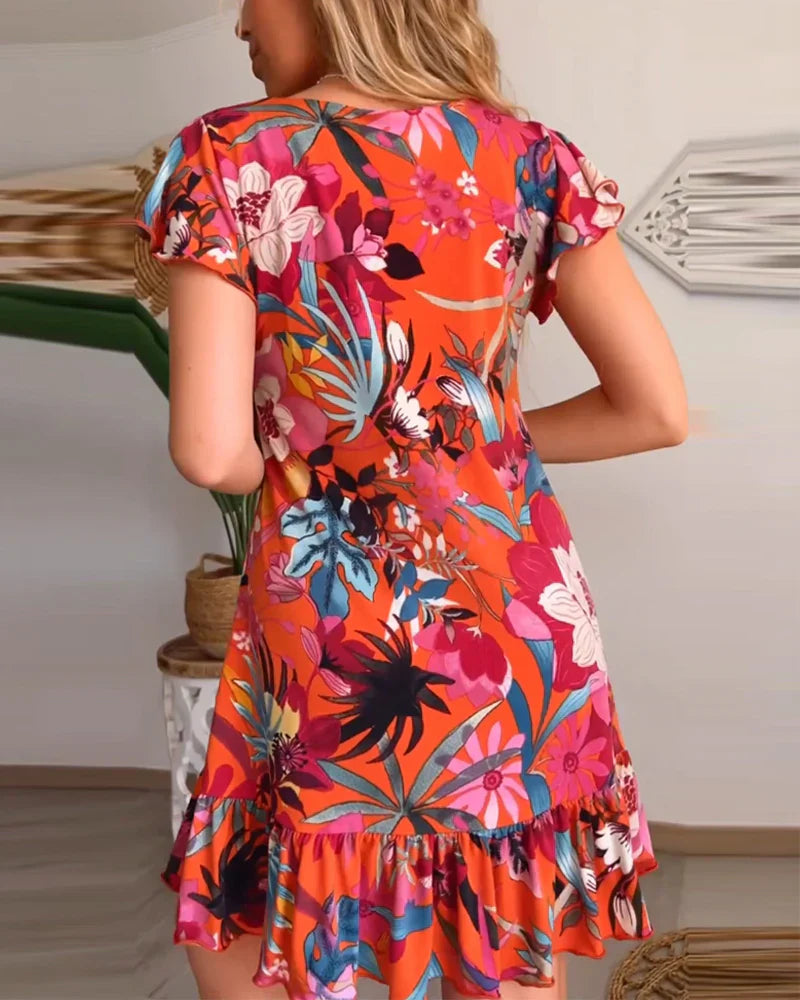 Elara | Abito a fiori con scollo a V e volant