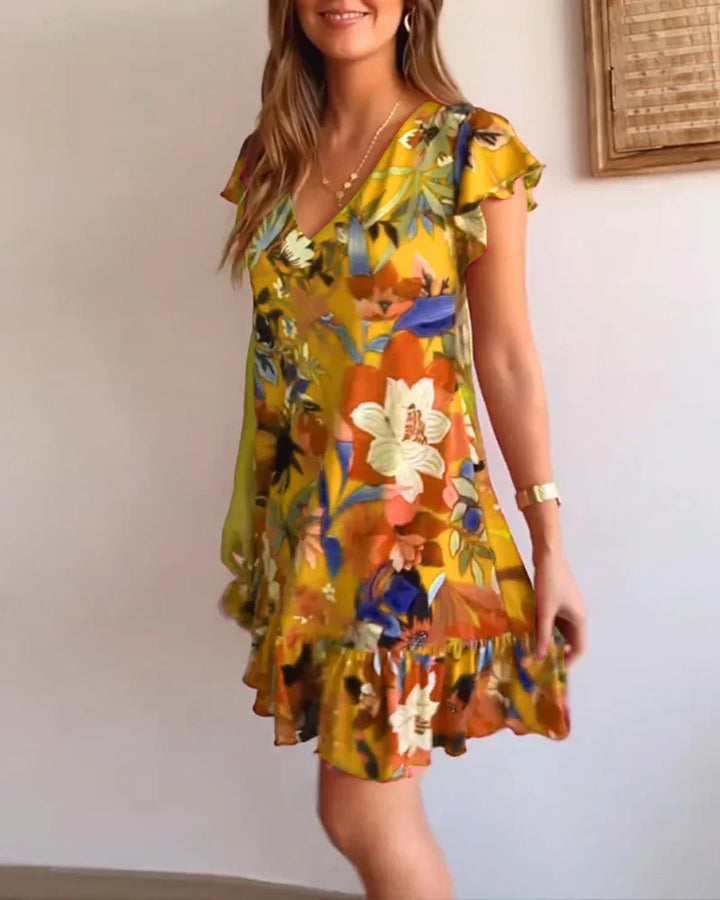 Elara | Abito a fiori con scollo a V e volant